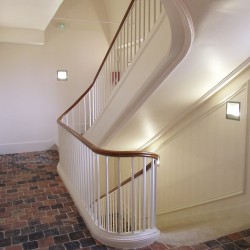 Prestigious and curved wooden custom-made stair realised for villa or luxury house
