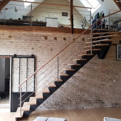 Double wooden central stringer stair